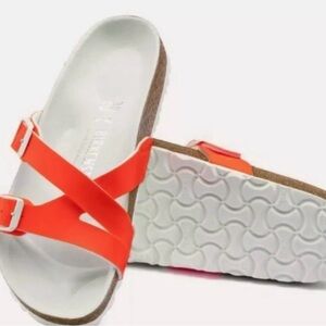 Orange Birkenstock Yao sandals